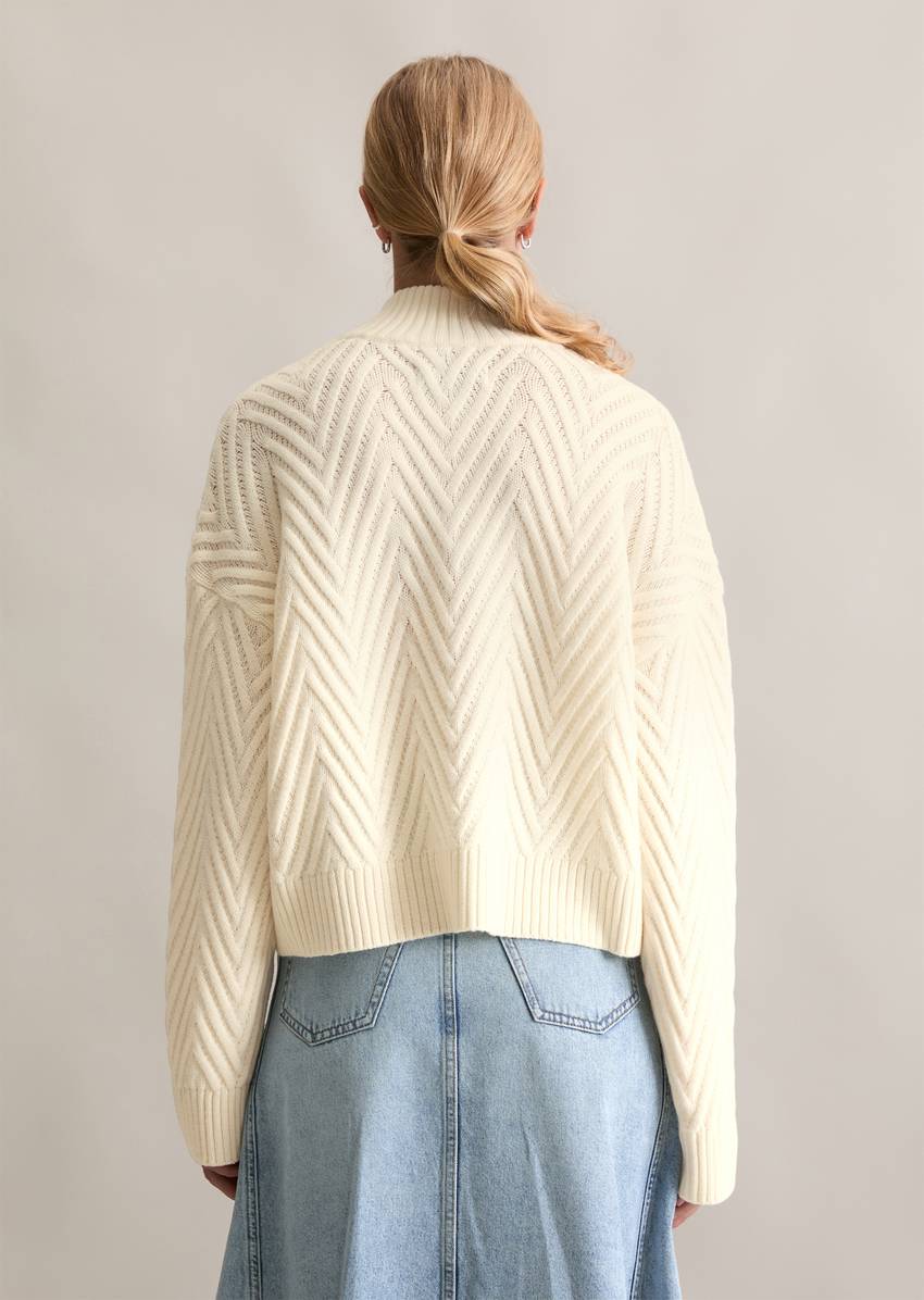 Relaxed knit troyer made from a soft virgin wool blend