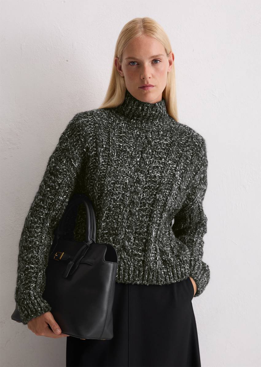 Cable knit oversized sweater made from a mix of alpaca wool, cotton and merino wool