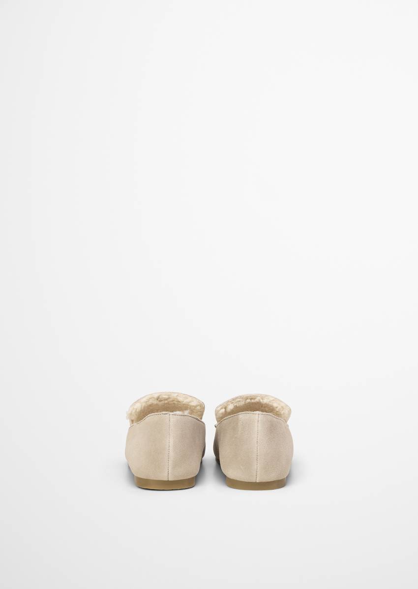 Leather slippers with teddy fur lining