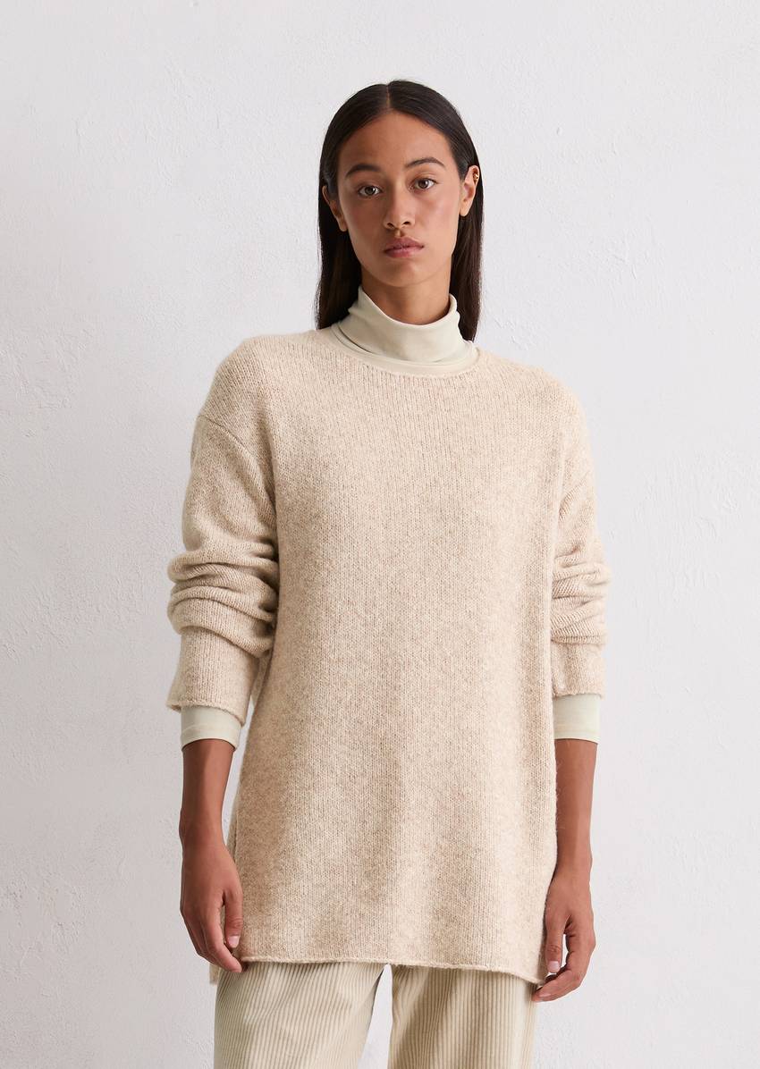 Sweater loose made from an organic cotton/alpaca/virgin wool mix