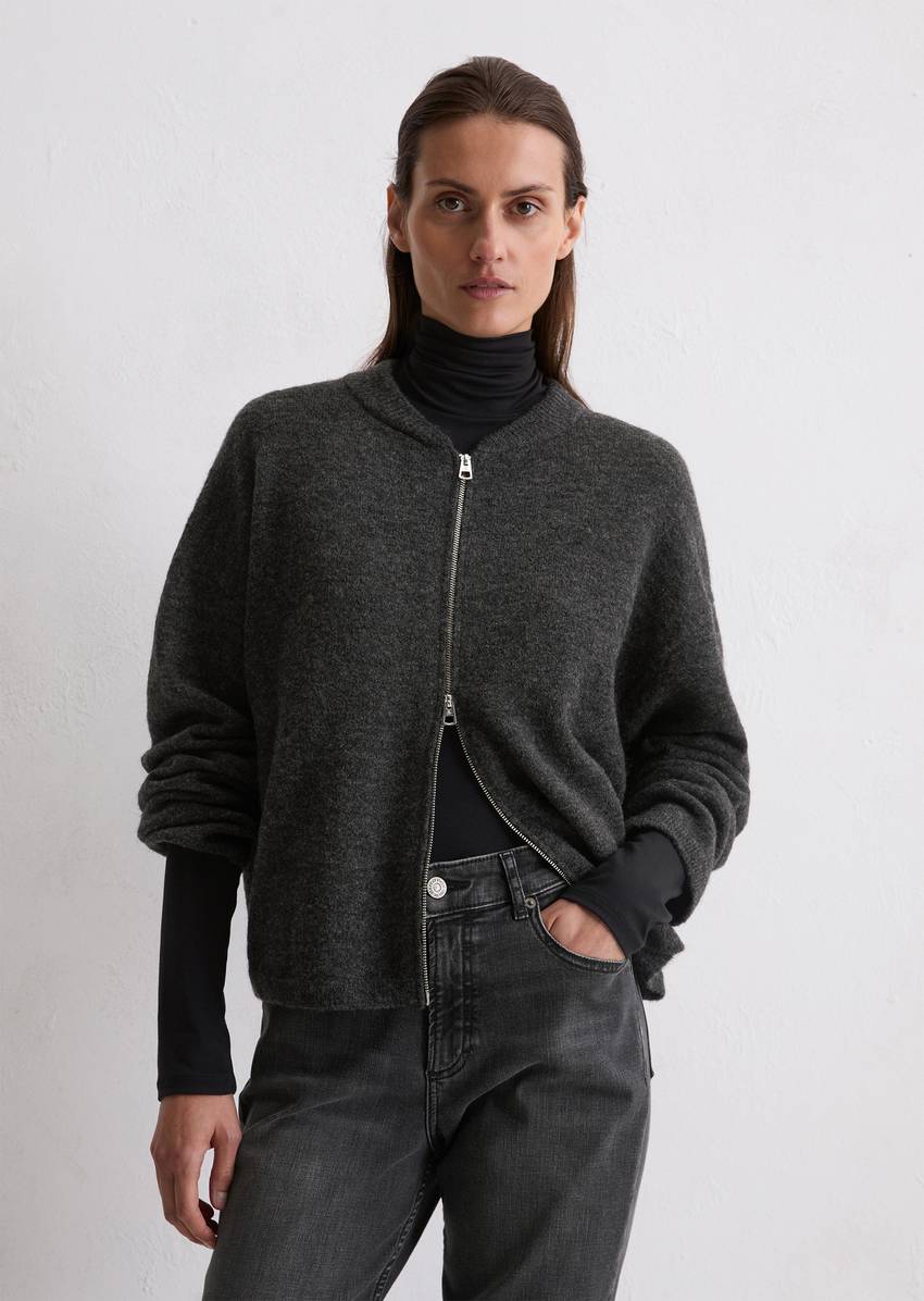 Knitted blouson loose made from a virgin wool/alpaca wool mix