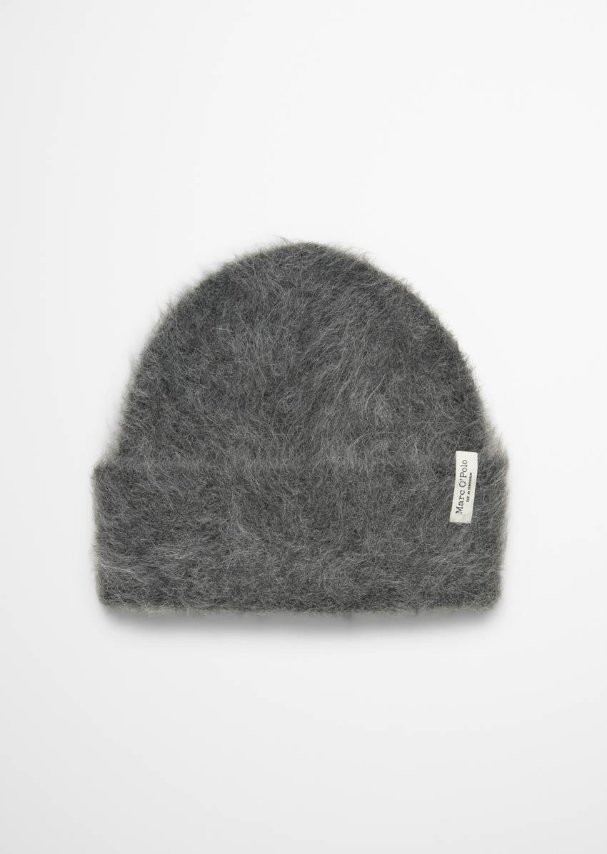 Knitted cap made from a fluffy alpaca wool mix