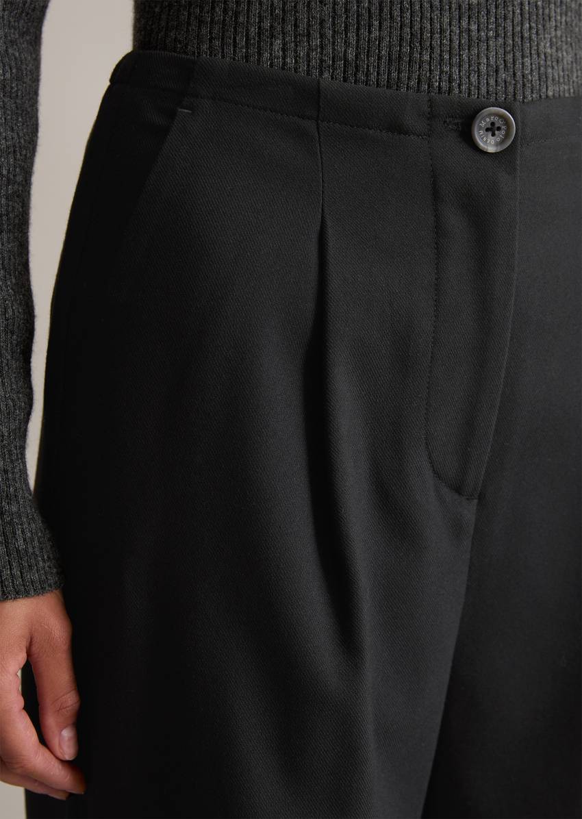 Pleated trousers loose tapered with recycled polyester and viscose