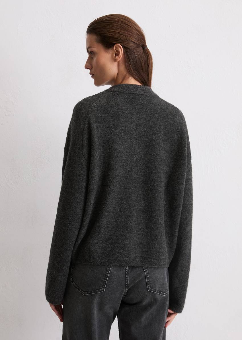 Knitted blouson loose made from a virgin wool/alpaca wool mix