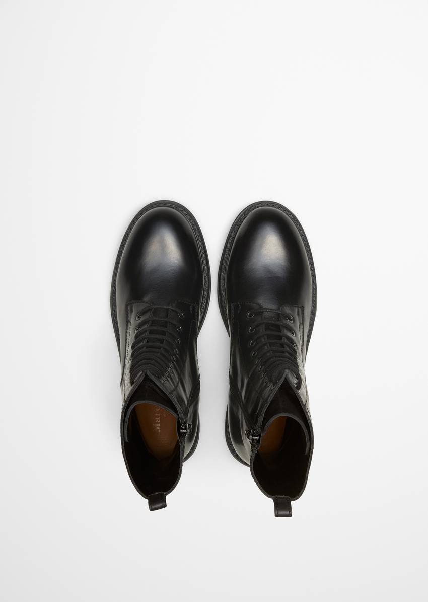 Lace-up boots with practical inside zipper