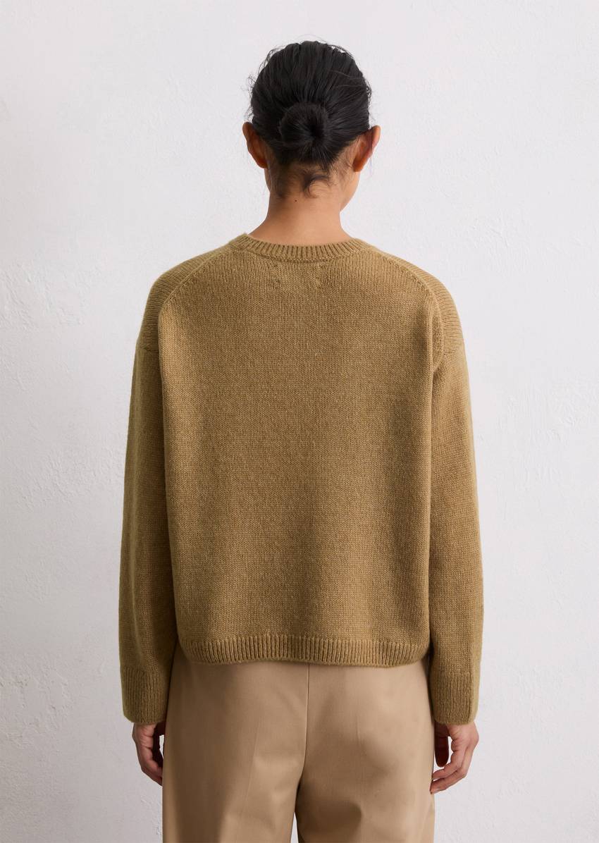 Loose knit sweater made from a soft virgin wool blend