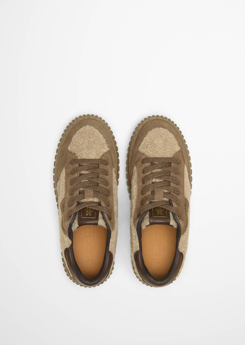 Platform sneaker made from suede and teddy fur