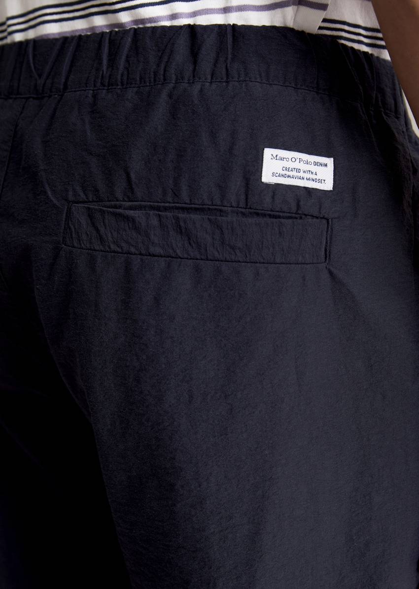 Jogger regular trousers with a fine crinkle texture