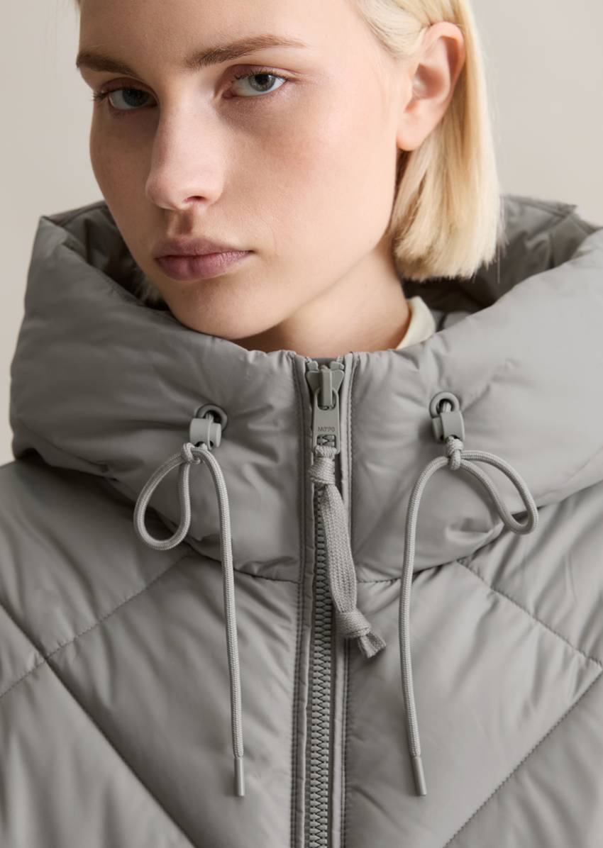 Long hooded quilted jacket relaxed made from recycled polyester