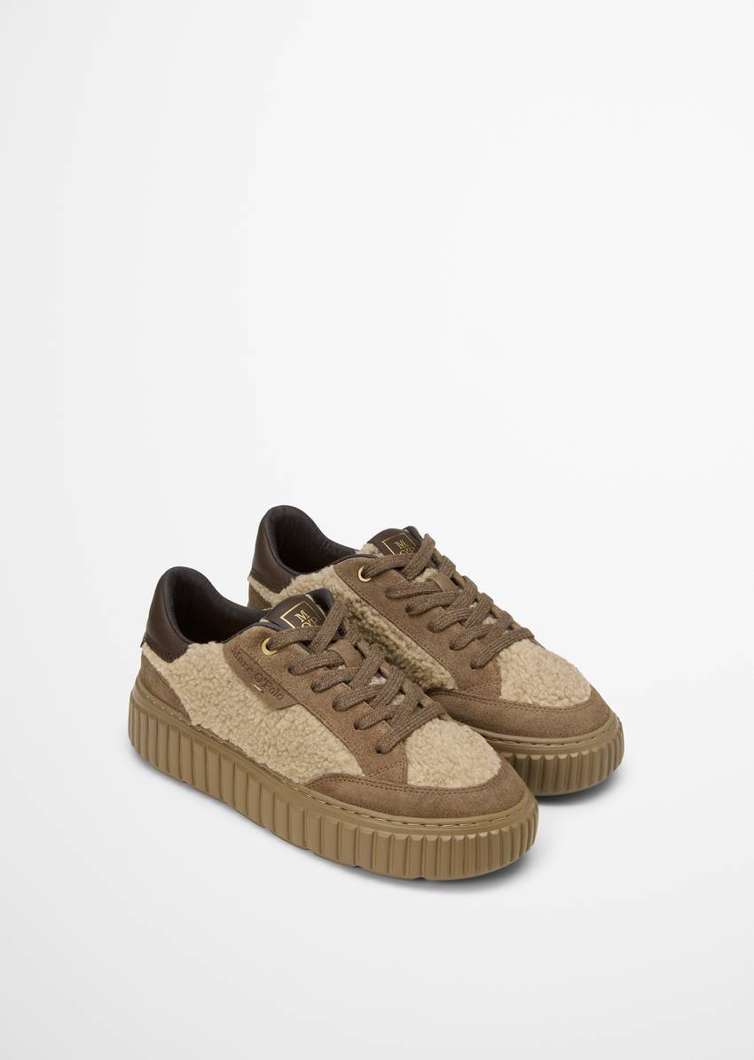 Platform sneaker made from suede and teddy fur