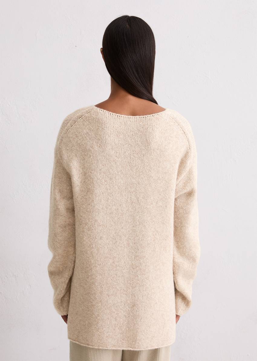 Sweater loose made from an organic cotton/alpaca/virgin wool mix