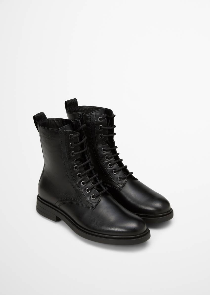 Lace-up boots with practical inside zipper
