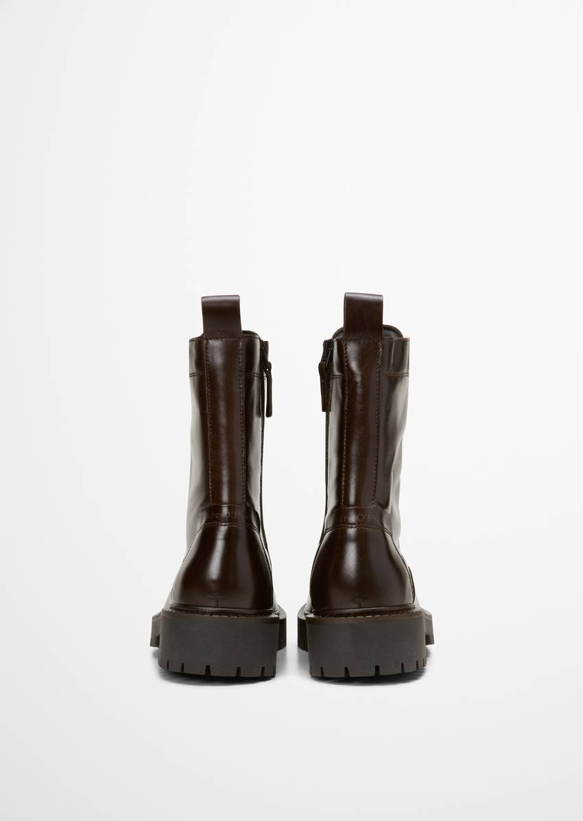 Lace-up boots with inside zipper