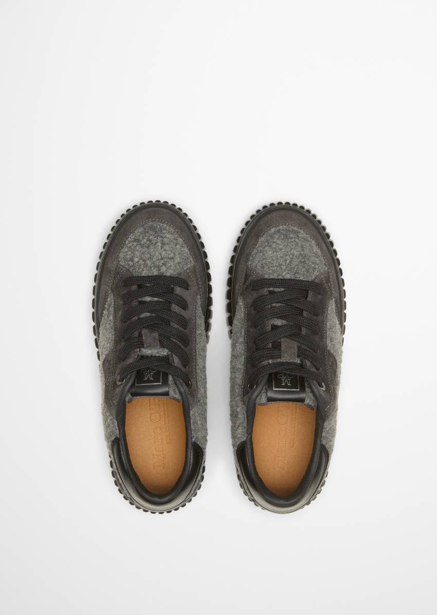 Platform sneaker made from suede and teddy fur
