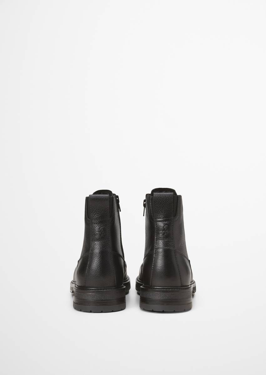 Lace-up boots with inside zipper