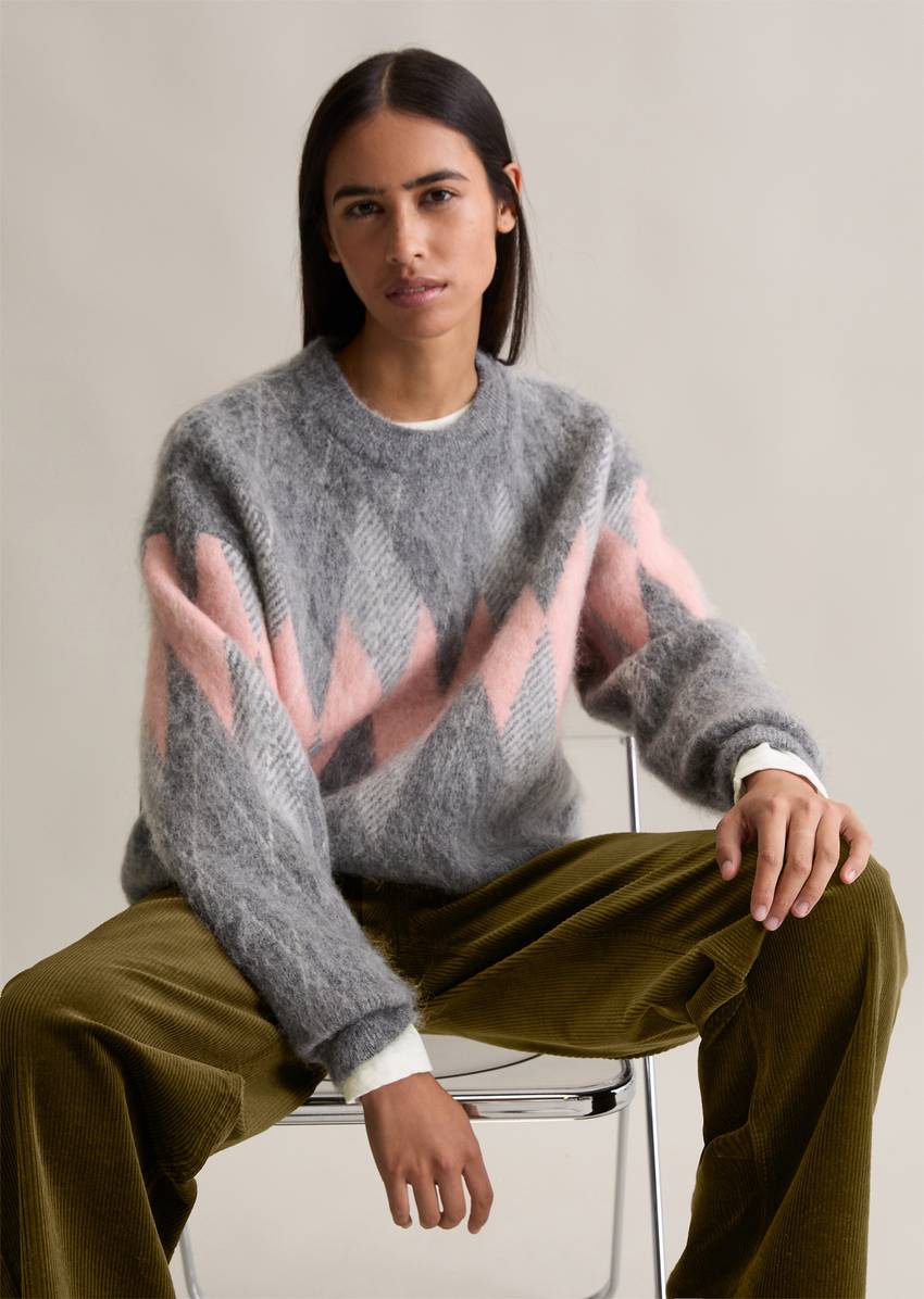 Relaxed knit sweater made from a cozy virgin wool and mohair blend