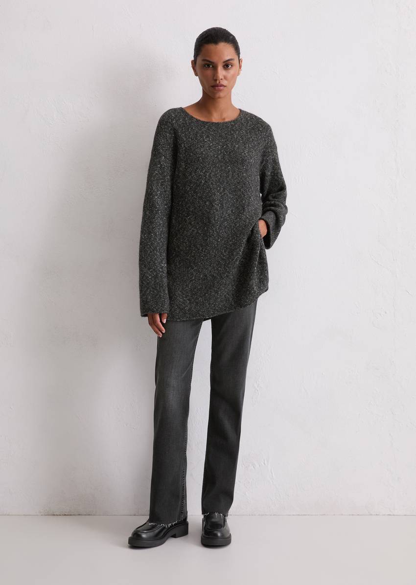 Sweater loose made from an organic cotton/alpaca/virgin wool mix