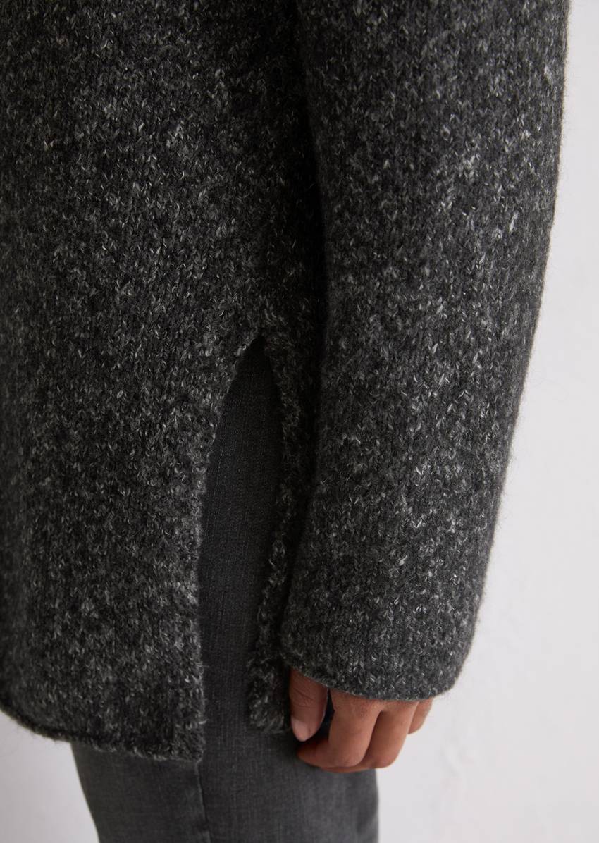 Sweater loose made from an organic cotton/alpaca/virgin wool mix