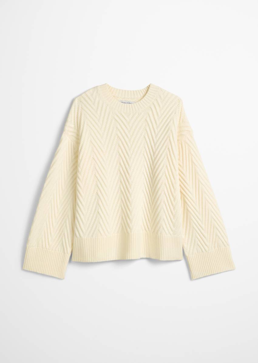 Relaxed knit sweater made from a soft virgin wool blend