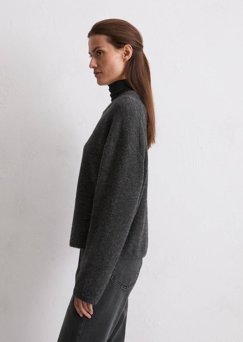 Knitted blouson loose made from a virgin wool/alpaca wool mix