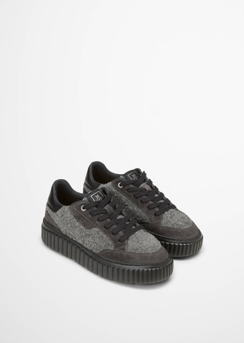 Platform sneaker made from suede and teddy fur