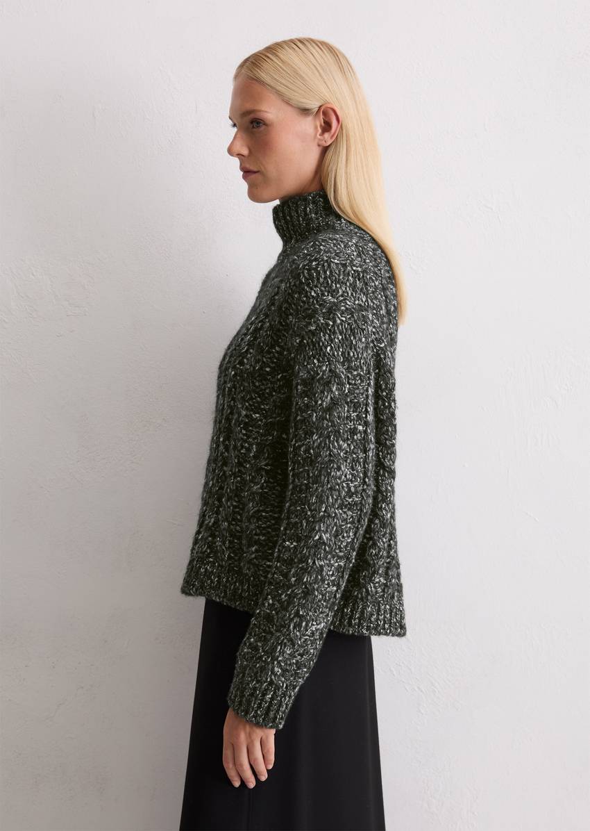 Cable knit oversized sweater made from a mix of alpaca wool, cotton and merino wool