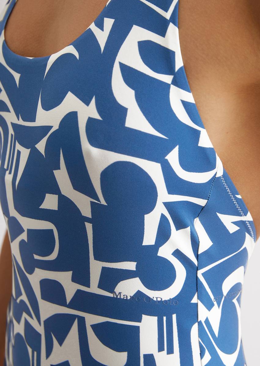 Halter neck swimsuit with geometric pattern