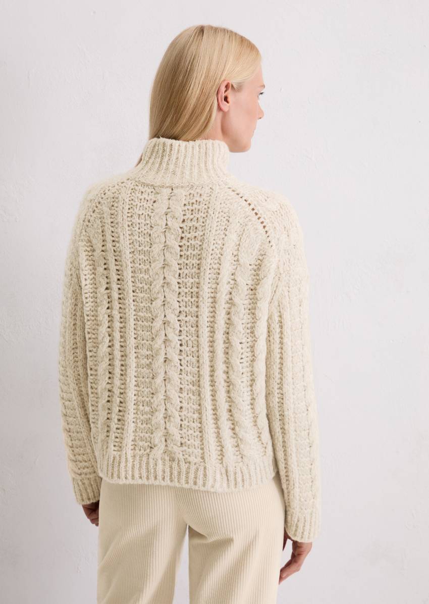 Cable knit oversized sweater made from a mix of alpaca wool, cotton and merino wool