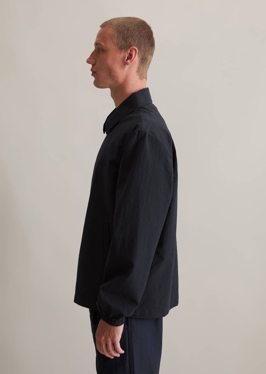 Coach jacket made from a textured organic cotton blend