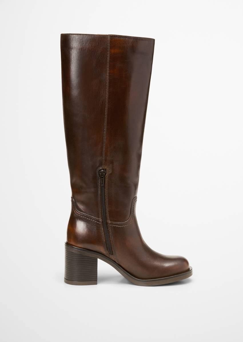 Long-shaft boots with a higher heel