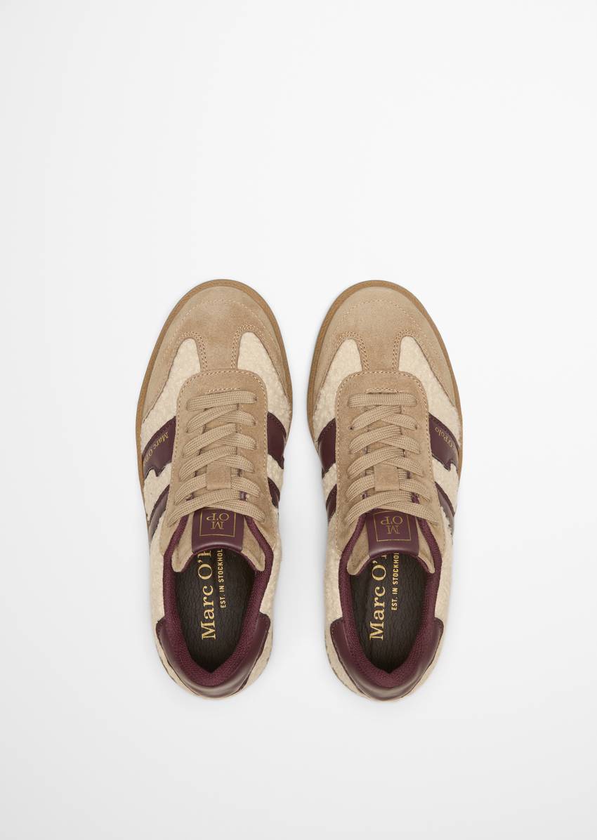 Sneaker made of leather and teddy fur