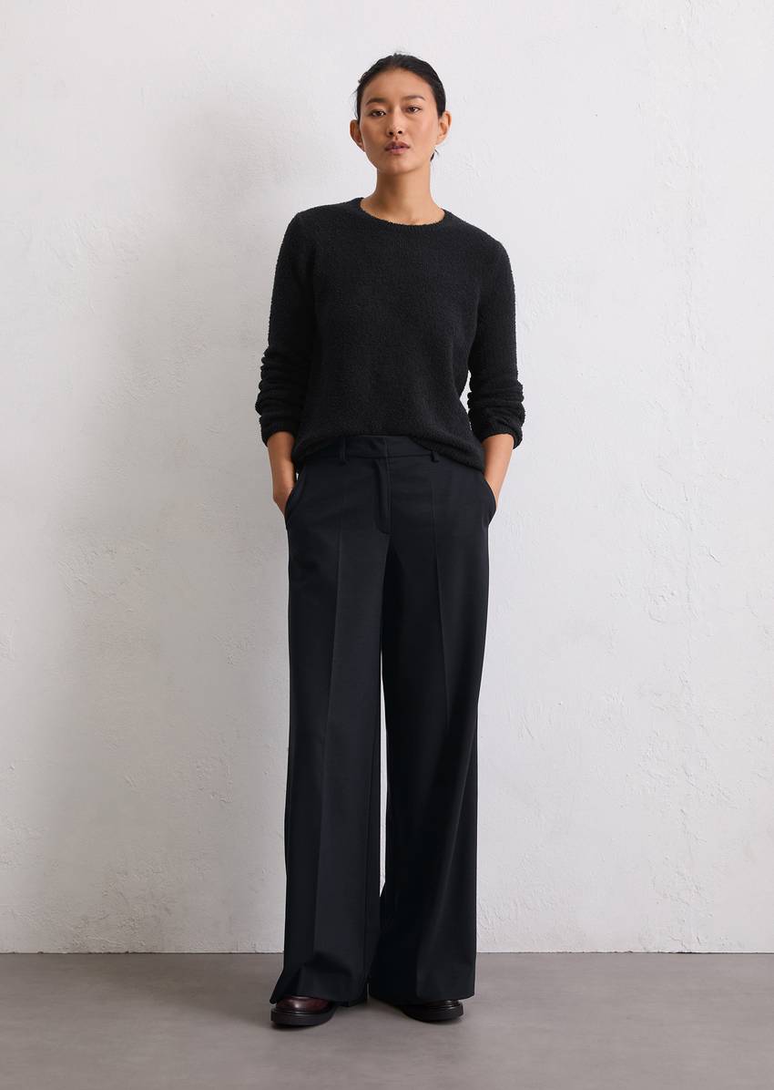 Knitted sweater regular made from bouclé yarn