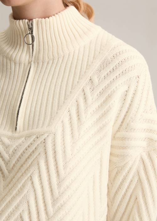 Relaxed knit troyer made from a soft virgin wool blend