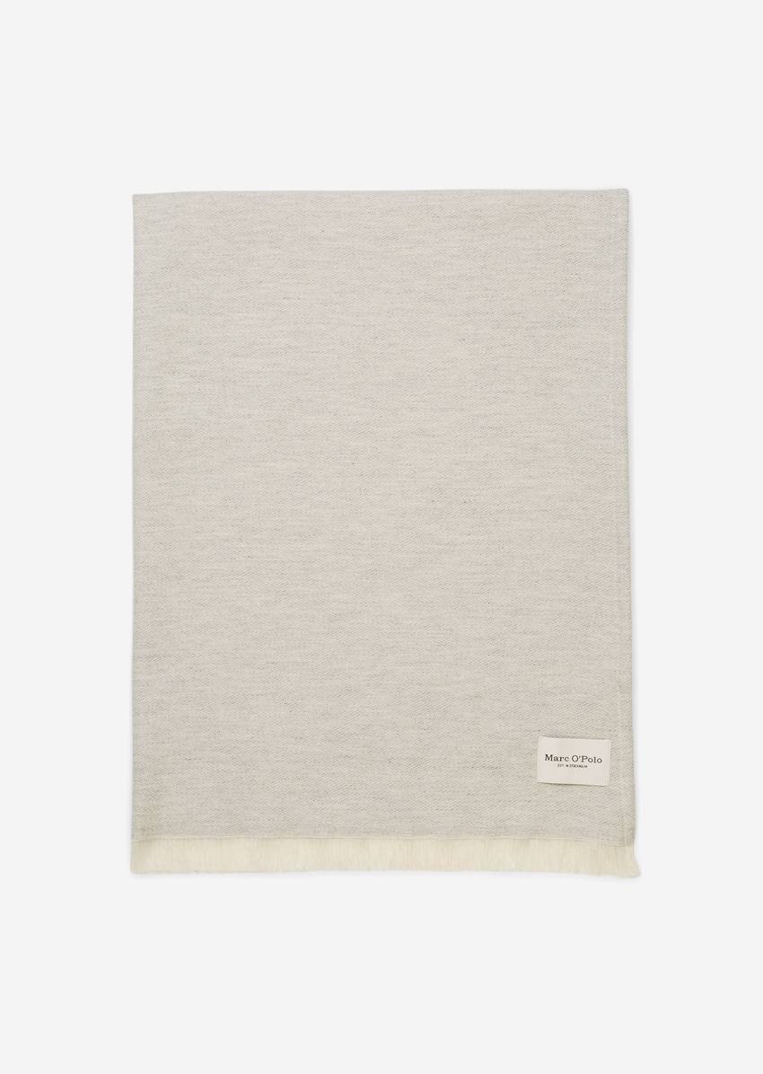 PER throw made of a soft blend of organic cotton and cashmere