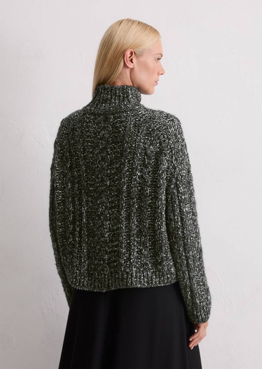 Cable knit oversized sweater made from a mix of alpaca wool, cotton and merino wool