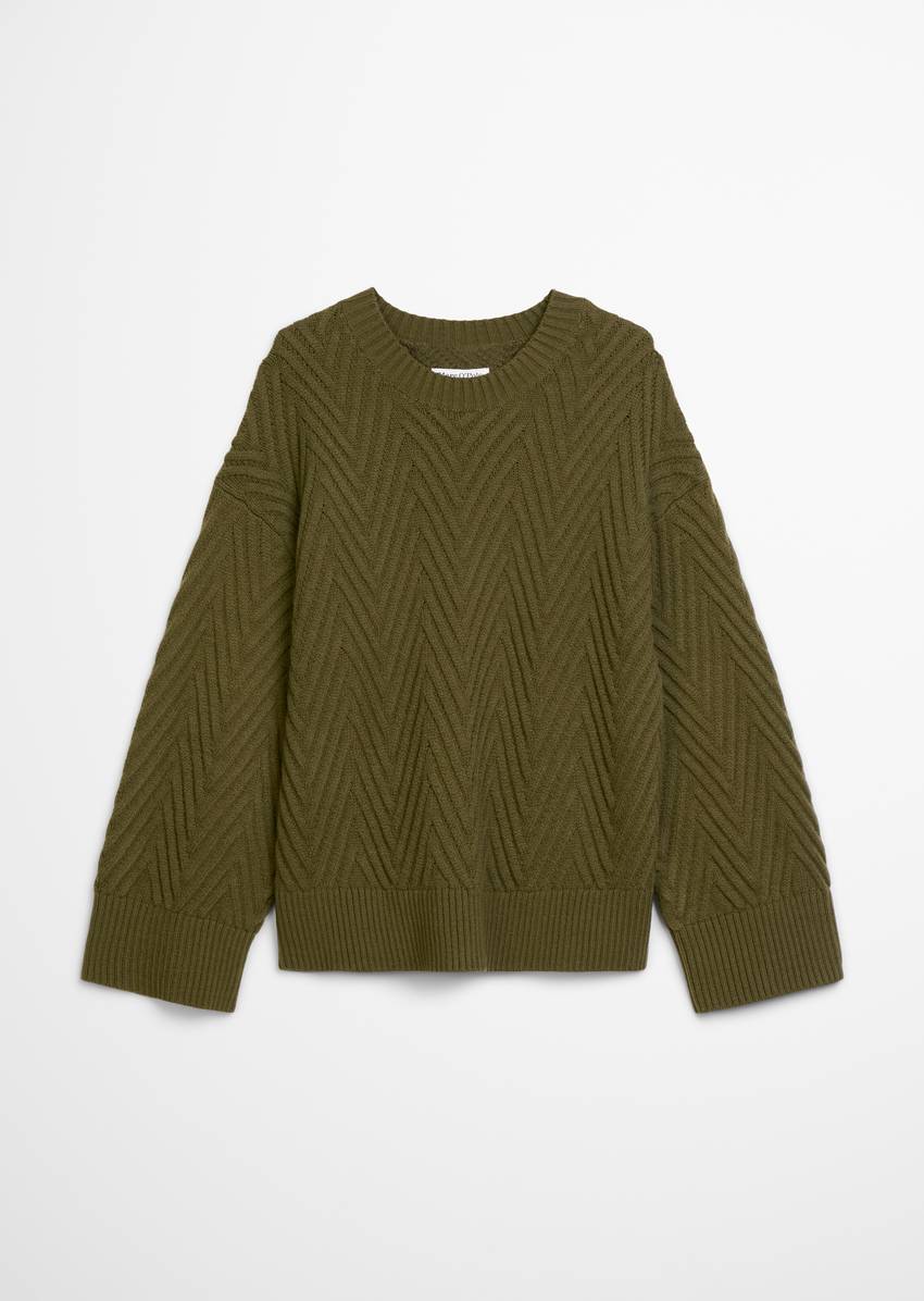 Relaxed knit sweater made from a soft virgin wool blend