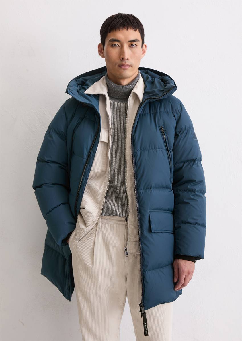 Regular puffer down jacket with functional pockets