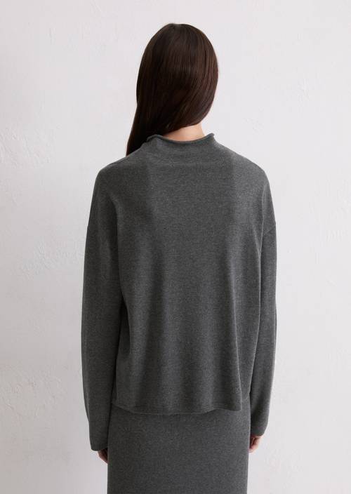 Oversized fine knit sweater made from a soft virgin wool blend