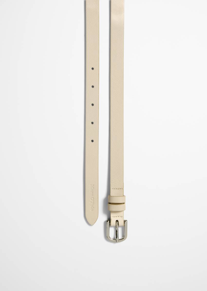 Belt with shiny metal buckle