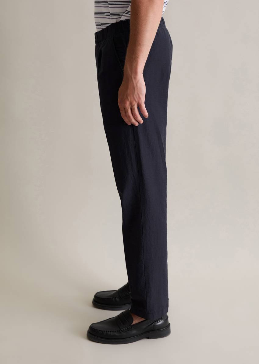 Jogger regular trousers with a fine crinkle texture