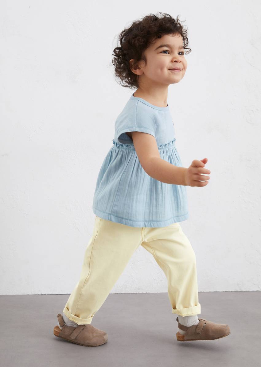 KIDS-GIRLS tunic blouse with a textured mix of organic cotton