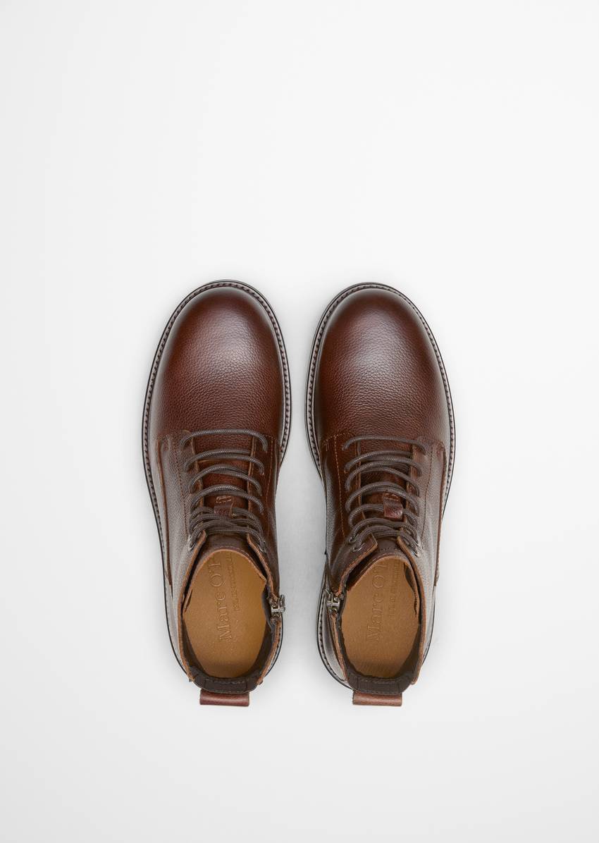 Lace-up boots with inside zipper