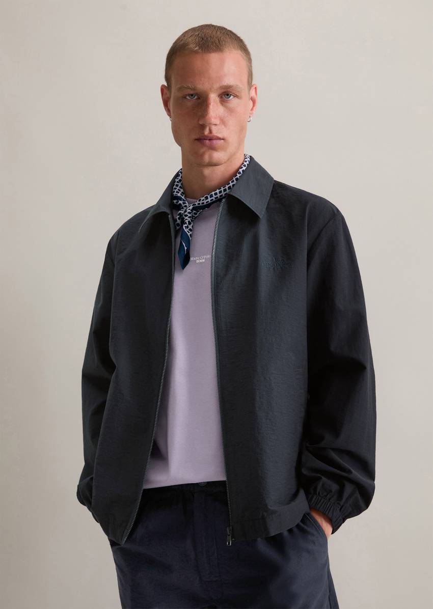 Coach jacket made from a textured organic cotton blend