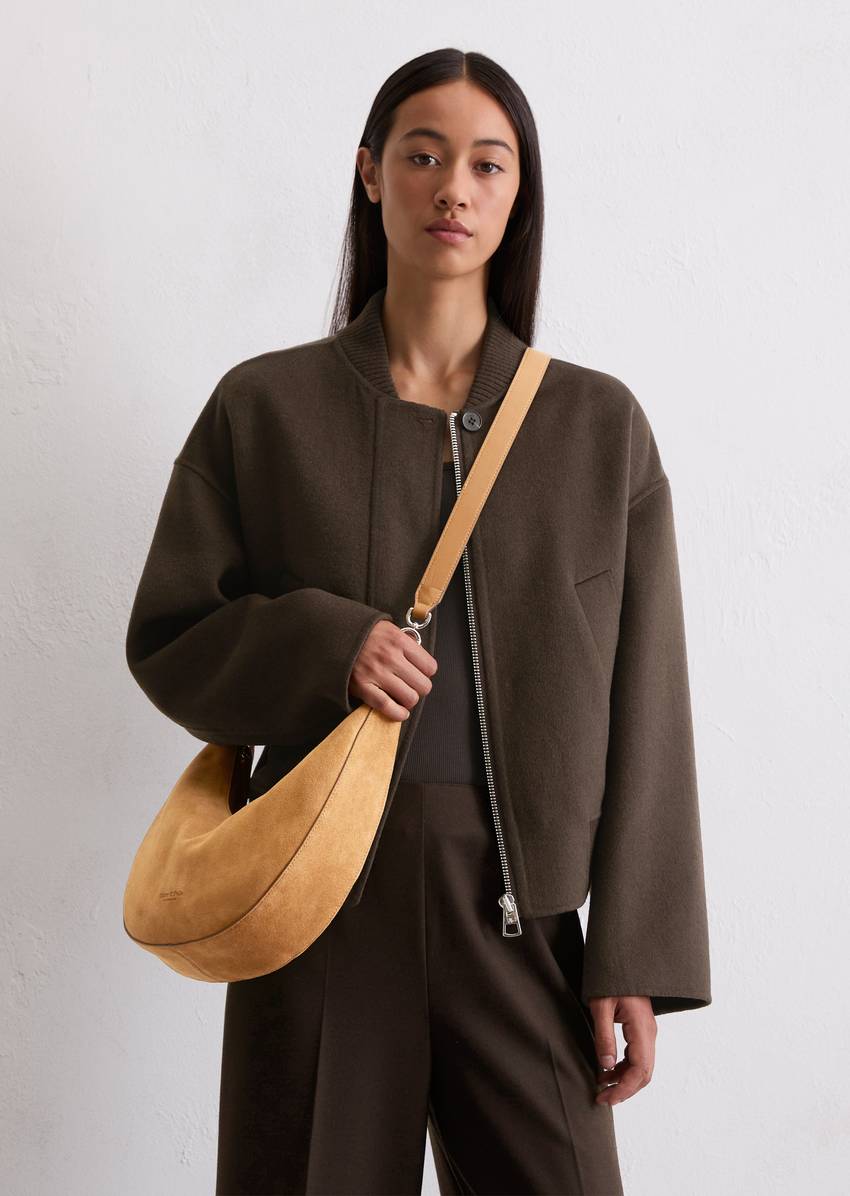 Crossbody bag small made from soft suede cowhide