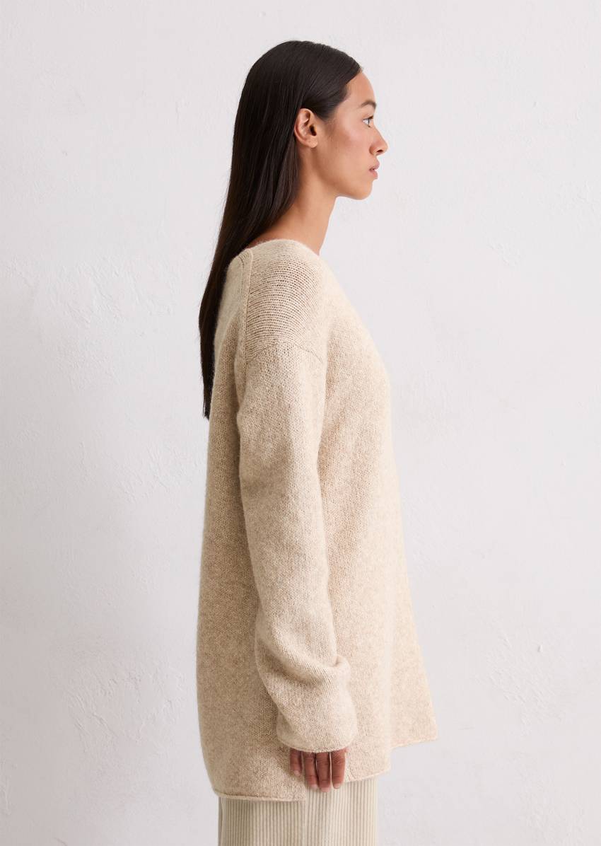 Sweater loose made from an organic cotton/alpaca/virgin wool mix