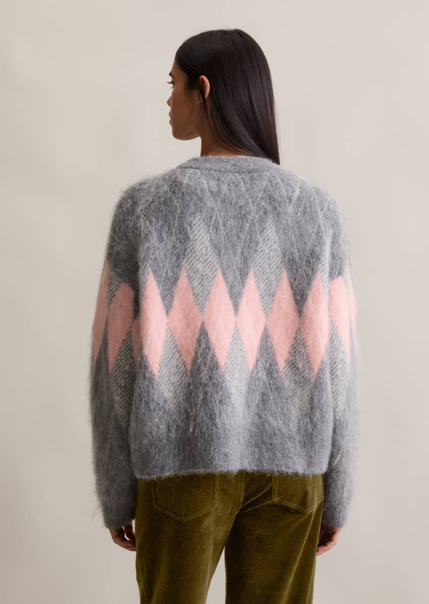 Relaxed knit sweater made from a cozy virgin wool and mohair blend