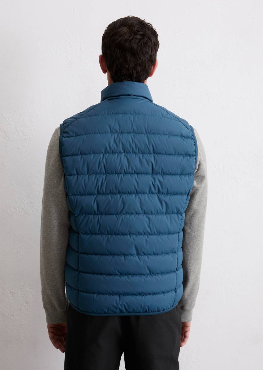 Regular quilted vest with practical pannier