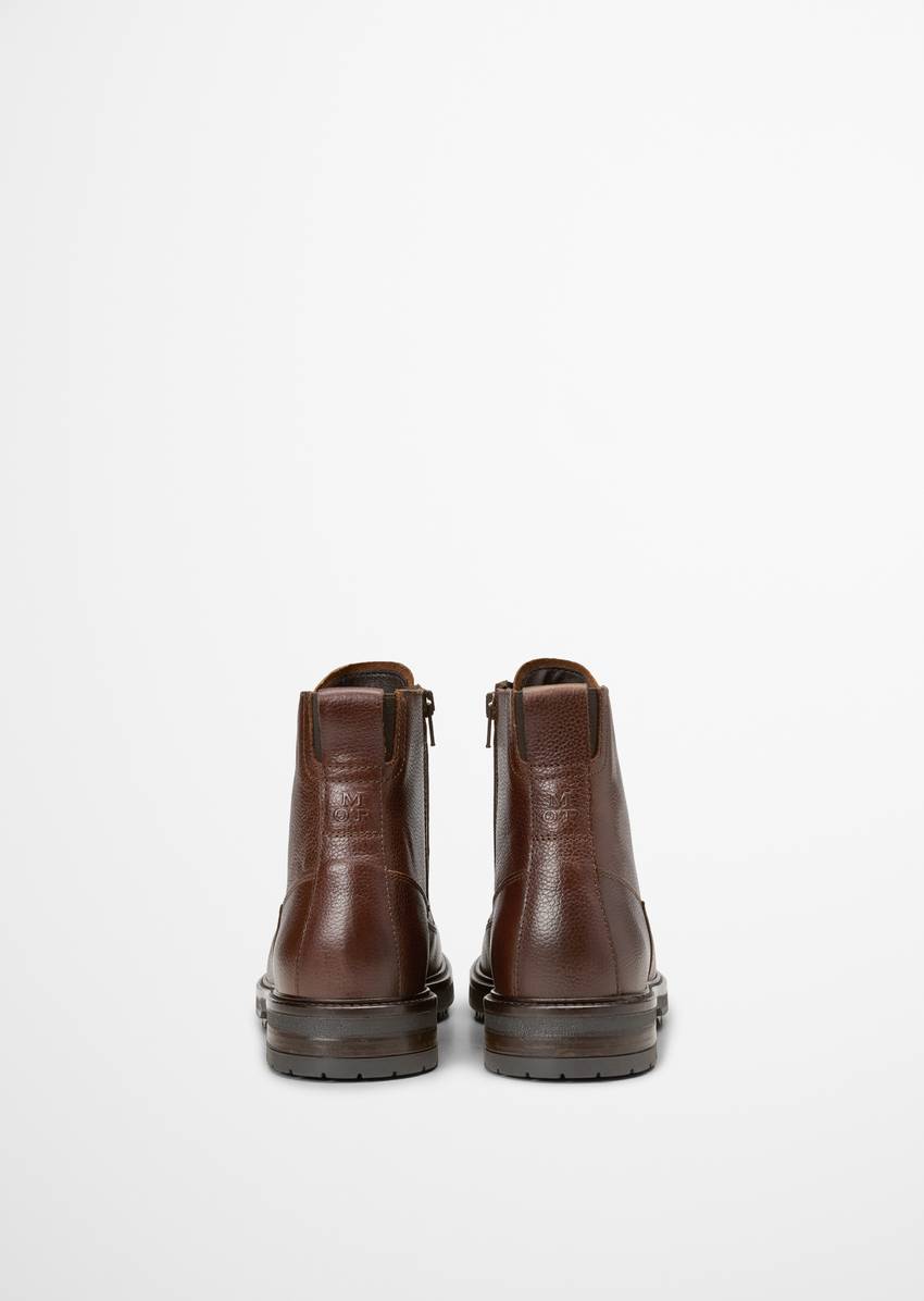 Lace-up boots with inside zipper