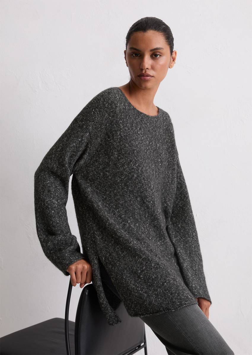 Sweater loose made from an organic cotton/alpaca/virgin wool mix