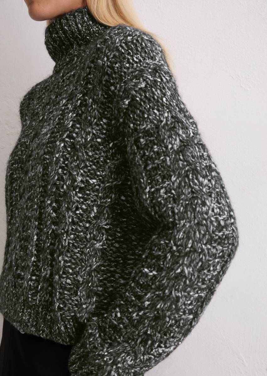 Cable knit oversized sweater made from a mix of alpaca wool, cotton and merino wool